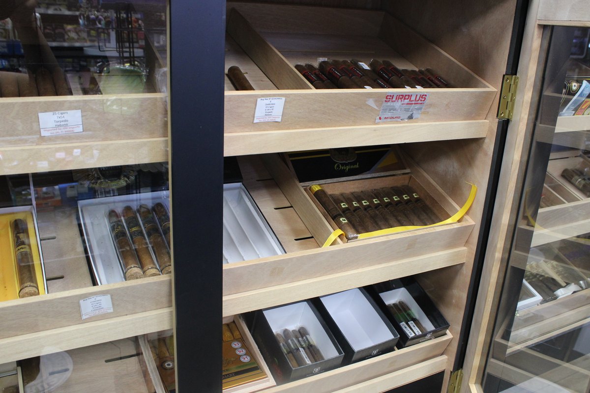 Gardens Smoke Shop interior photo 33