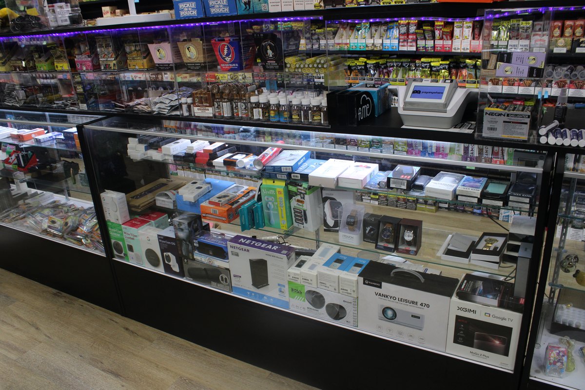 Gardens Smoke Shop interior photo 34