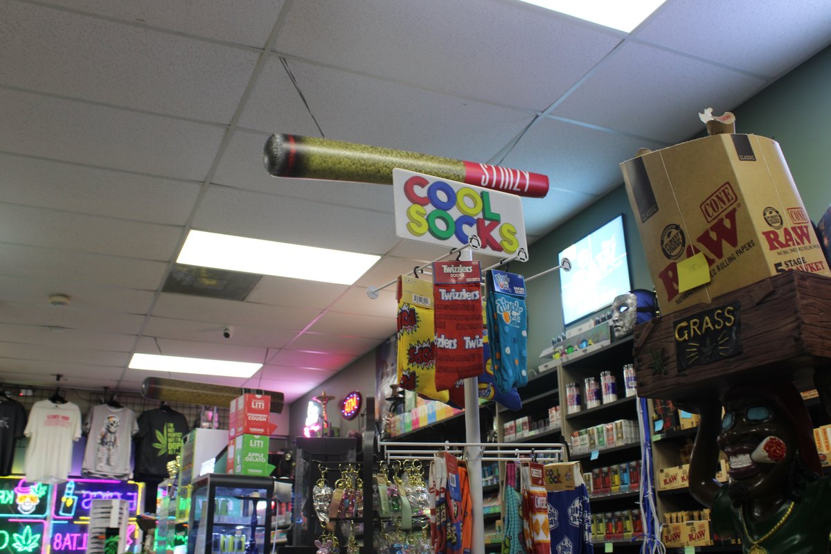 Gardens Smoke Shop interior photo 53